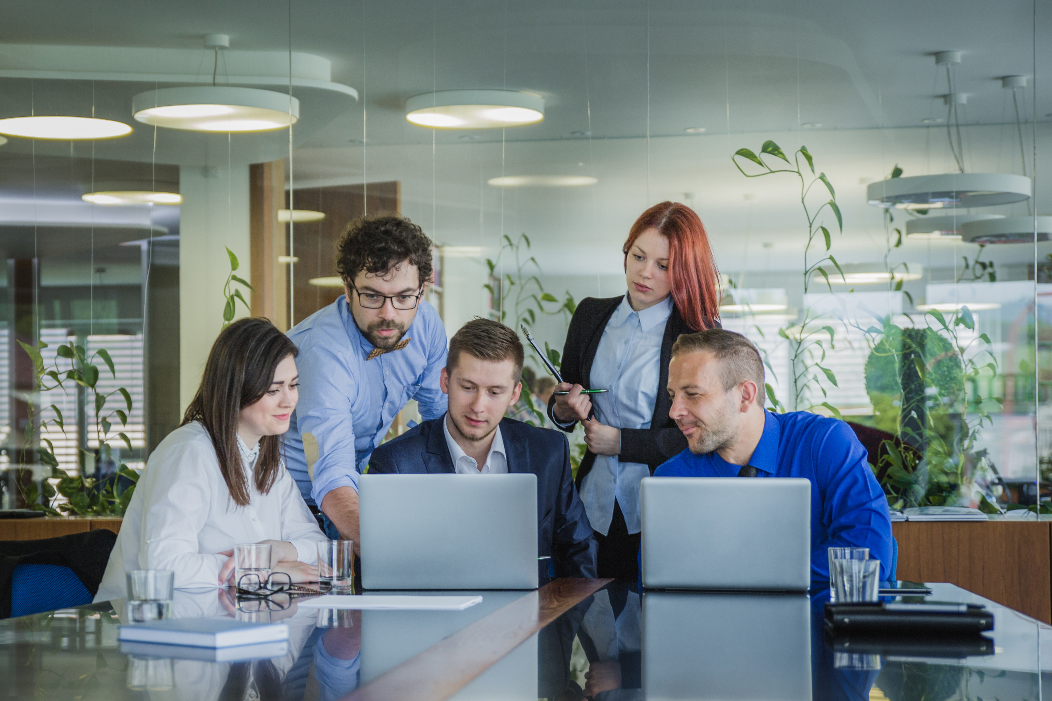 Professionals collaborating in a modern office.